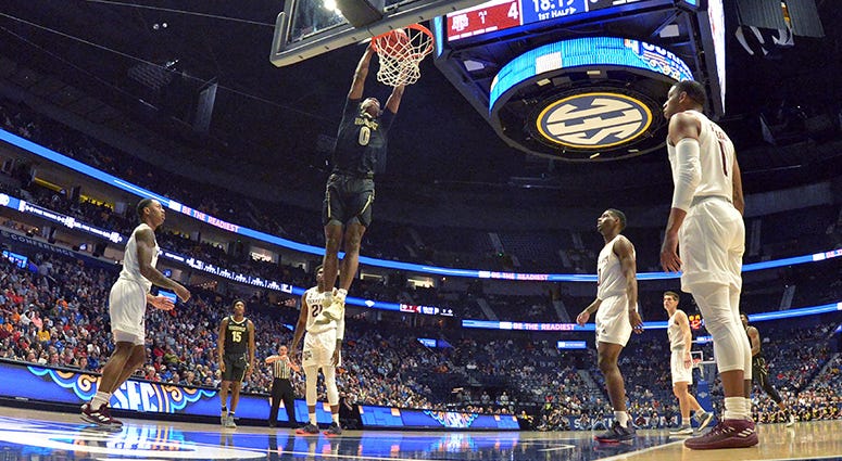 Vanderbilt Commodores guard Saben Lee (0) shoots the ball against the Texas A&M Aggies during the first half of game two in the SEC conference tournament at Bridgestone Arena. Vanderbilt Commodores guard Saben Lee (0) shoots the ball against the Texas A&M Aggies during the first half of game two in the SEC conference tournament at Bridgestone Arena.