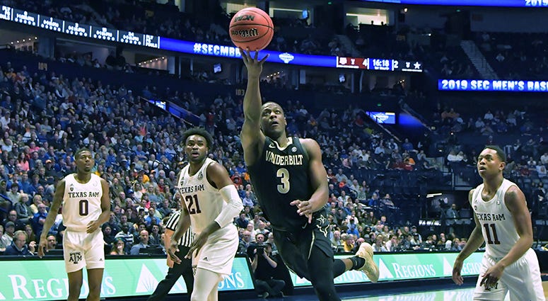 Vanderbilt Commodores guard Maxwell Evans (3) shoots the ball against the Texas A&M Aggies during the first half of game two in the SEC conference tournament at Bridgestone Arena. Vanderbilt Commodores guard Maxwell Evans (3) shoots the ball against the Texas A&M Aggies during the first half of game two in the SEC conference tournament at Bridgestone Arena.
