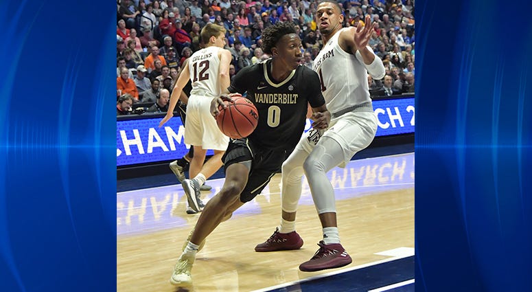 Vanderbilt Commodores guard Saben Lee (0) dribbles the ball against the Texas A&M Aggies during the first half of game two in the SEC conference tournament at Bridgestone Arena. Vanderbilt Commodores guard Saben Lee (0) dribbles the ball against the Texas A&M Aggies during the first half of game two in the SEC conference tournament at Bridgestone Arena.