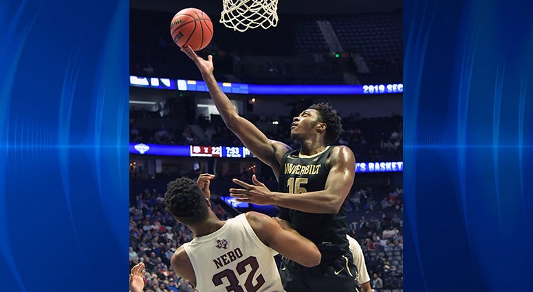 Vanderbilt Commodores forward Clevon Brown (15) is defended by Texas A&M Aggies forward Josh Nebo (32) during the first half of game two in the SEC conference tournament at Bridgestone Arena. Vanderbilt Commodores forward Clevon Brown (15) is defended by Texas A&M Aggies forward Josh Nebo (32) during the first half of game two in the SEC conference tournament at Bridgestone Arena.