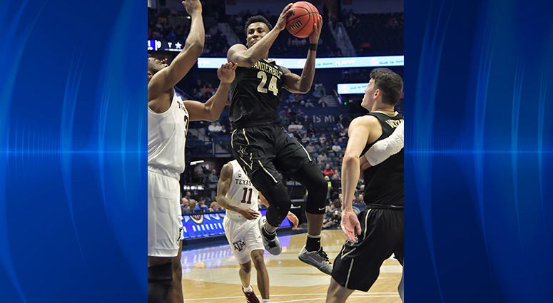 Vanderbilt Commodores forward Aaron Nesmith (24) shoots the ball against the Texas A&M Aggies during the first half of game two in the SEC conference tournament at Bridgestone Arena. Vanderbilt Commodores forward Aaron Nesmith (24) shoots the ball against the Texas A&M Aggies during the first half of game two in the SEC conference tournament at Bridgestone Arena.