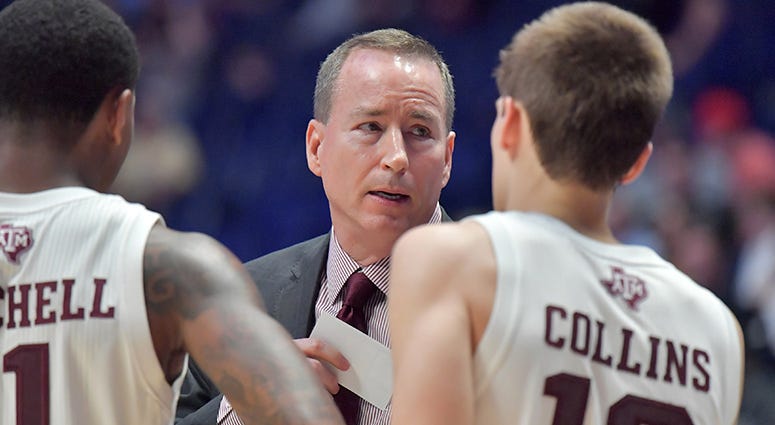 Texas A&M Aggies coach Billy Kennedy speaks to players during a stoppage in play in the second half against the Vanderbilt Commodores of the SEC conference tournament at Bridgestone Arena Texas A&M Aggies coach Billy Kennedy speaks to players during a stoppage in play in the second half against the Vanderbilt Commodores of the SEC conference tournament at Bridgestone Arena