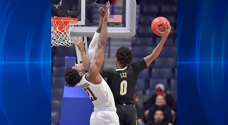 Vanderbilt Commodores guard Saben Lee (0) is defended by Texas A&M Aggies forward Christian Mekowulu (21) in the second half of the SEC conference tournament at Bridgestone Arena. Vanderbilt Commodores guard Saben Lee (0) is defended by Texas A&M Aggies forward Christian Mekowulu (21) in the second half of the SEC conference tournament at Bridgestone Arena.