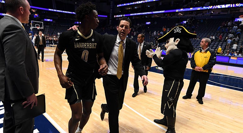 anderbilt Commodores head coach Bryce Drew and Vanderbilt Commodores guard Saben Lee (0) walk off the court after a loss to the Texas A&M Aggies of the SEC conference tournament at Bridgestone Arena. anderbilt Commodores head coach Bryce Drew and Vanderbilt Commodores guard Saben Lee (0) walk off the court after a loss to the Texas A&M Aggies of the SEC conference tournament at Bridgestone Arena.
