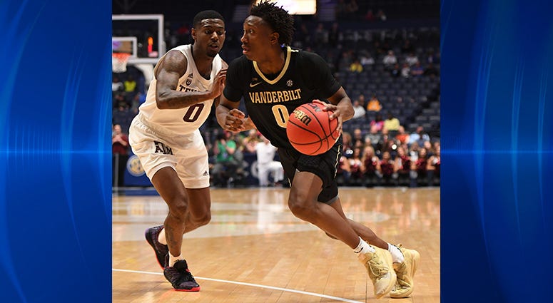 anderbilt Commodores guard Saben Lee (0) works against Texas A&M Aggies guard Jay Jay Chandler (0) during the second half of the SEC conference tournament at Bridgestone Arena. anderbilt Commodores guard Saben Lee (0) works against Texas A&M Aggies guard Jay Jay Chandler (0) during the second half of the SEC conference tournament at Bridgestone Arena.
