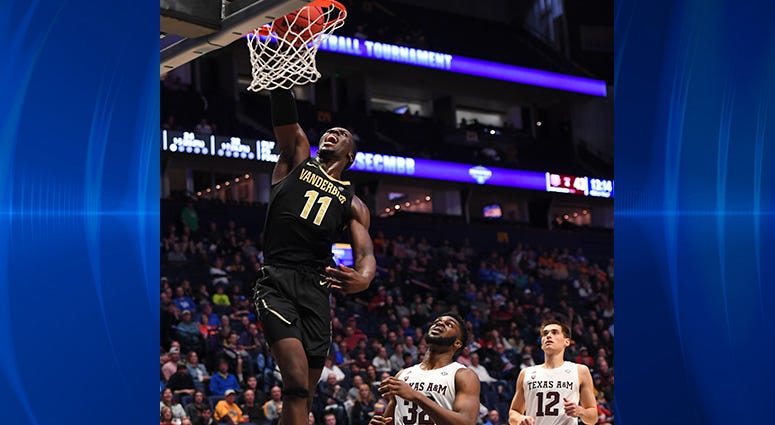 Vanderbilt Commodores forward Simisola Shittu (11) dunks the ball during the second half against the Texas A&M Aggies of the SEC conference tournament at Bridgestone Arena. Vanderbilt Commodores forward Simisola Shittu (11) dunks the ball during the second half against the Texas A&M Aggies of the SEC conference tournament at Bridgestone Arena.