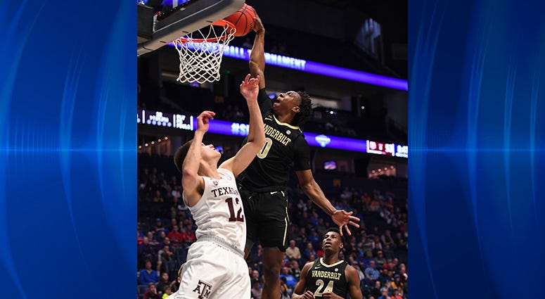 Vanderbilt Commodores guard Saben Lee (0) dunks the ball over Texas A&M Aggies guard Chris Collins (12) during the second half of the SEC conference tournament at Bridgestone Arena. Vanderbilt Commodores guard Saben Lee (0) dunks the ball over Texas A&M Aggies guard Chris Collins (12) during the second half of the SEC conference tournament at Bridgestone Arena.