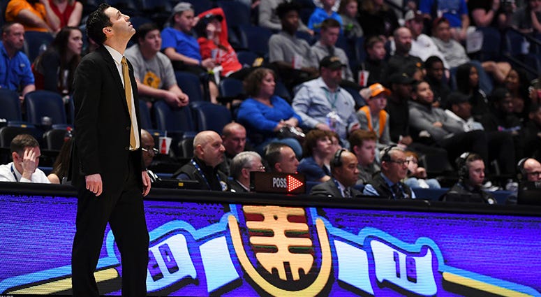 Vanderbilt Commodores head coach Bryce Drew looks up at the scoreboard in the final minutes of a loss to Texas A&M Aggies in the SEC conference tournament at Bridgestone Arena. Vanderbilt Commodores head coach Bryce Drew looks up at the scoreboard in the final minutes of a loss to Texas A&M Aggies in the SEC conference tournament at Bridgestone Arena.