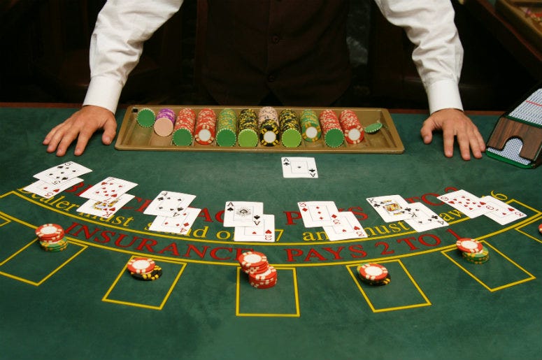 Casino table with cards ready for playing. 100.3 Jack FM,Hackers,Data Leak,Cybersecurity,Smart Technology,Casino,Termostat,Thermometer,Aquarium,Cloud