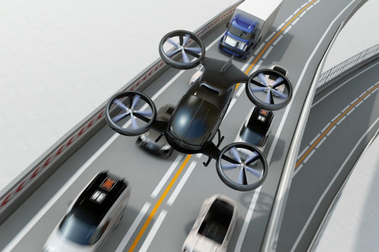 3D rendering of concept passenger drone flying over cars in heavy traffic jam. Uber,Uber Air,Flying Taxi,Aircraft,First,New,Prototype,CBS,CEO,Dara Khosrowshahi,Plane,Drone,Video,100.3 Jack FM