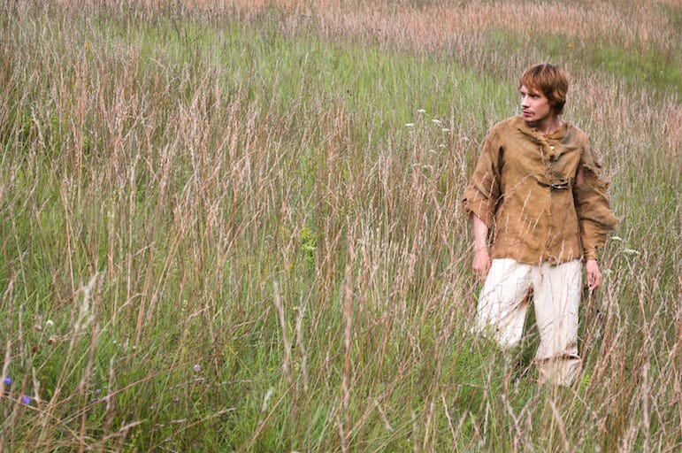 Young Man, Medieval Peasant, Walking, Field, Grass Young Man, Medieval Peasant, Walking, Field, Grass