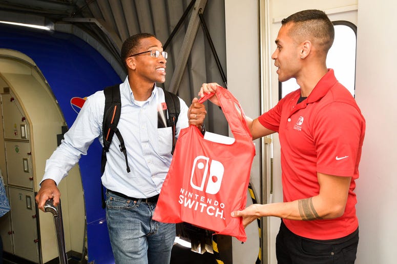 Guy getting a free Nintendo Switch