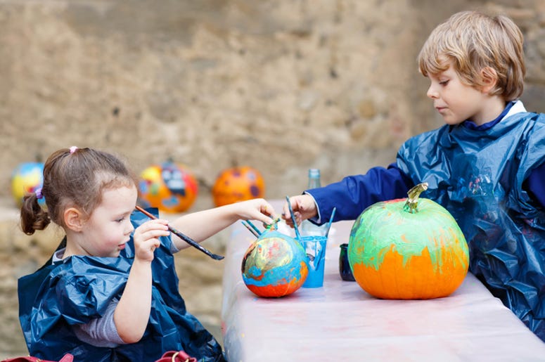 Kids Decorating Pumpkins