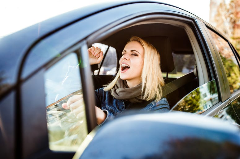 Girl Listening To Music in Her Car