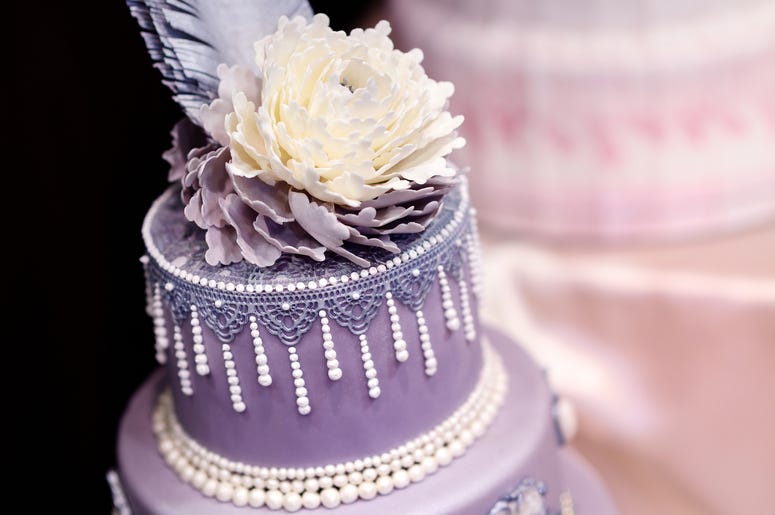 Purple Cake With White Flowers