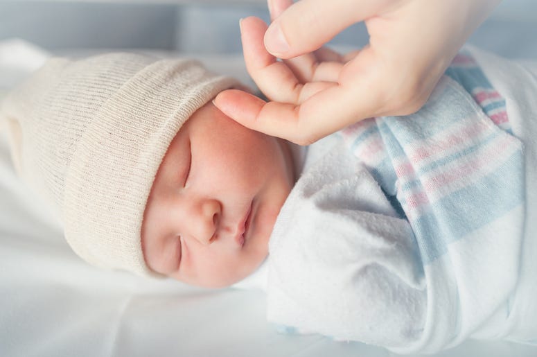 Newborn, Baby, Bed, Sleeping, Hospital, Mother's Hands Newborn, Baby, Bed, Sleeping, Hospital, Mother's Hands