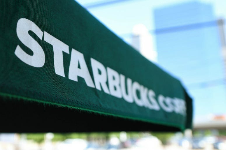View of an umbrella at Starbucks. Starbucks,Racial Bias,Training,May 29,8000,Stores,Coffee,Shop,Close,US,100.3 Jack FM