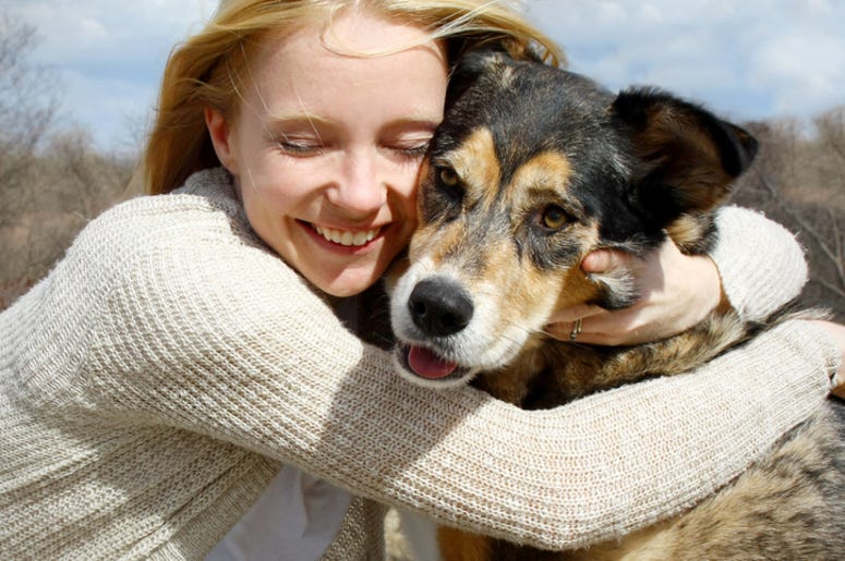 Woman Hugging German Shepherd Dog Woman Hugging German Shepherd Dog