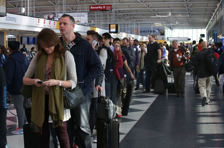 Passengers in line to go through TSA Passengers in line to go through TSA