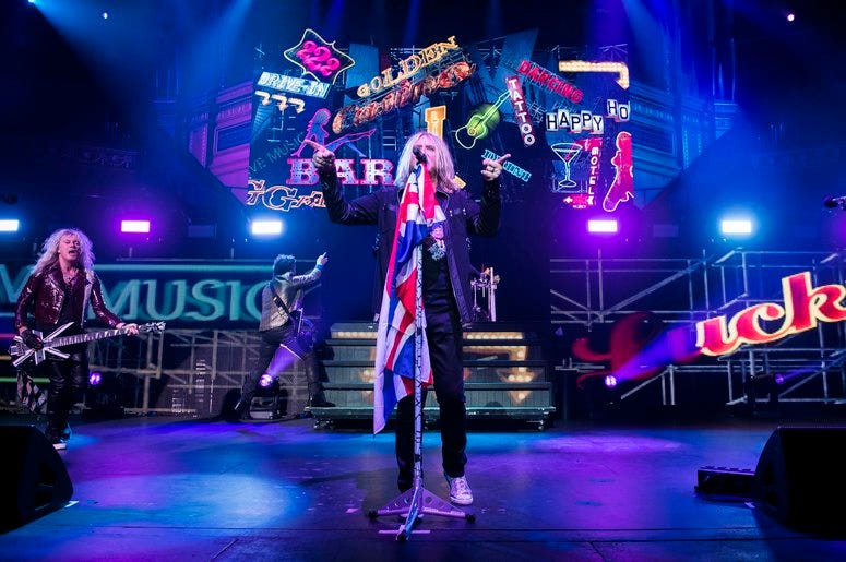 Def Leppard on stage at the Royal Albert Hall, London. Def Leppard on stage at the Royal Albert Hall, London.