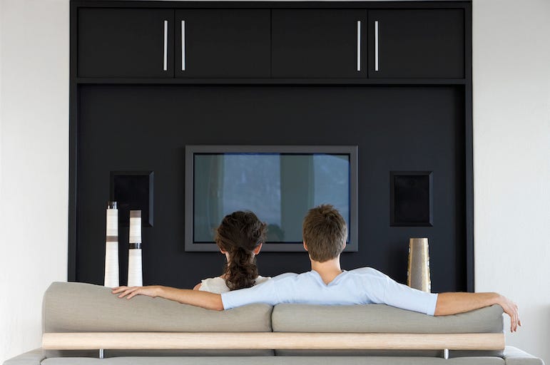 Couple, Man, Woman, Living Room, Couch, Watching TV Couple, Man, Woman, Living Room, Couch, Watching TV