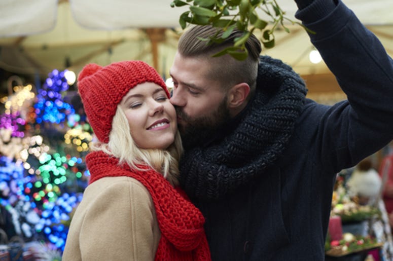 Couple Under The Mistletoe