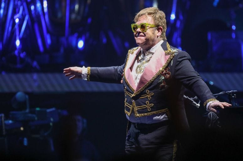 Sir Elton John performs Sir Elton John performs