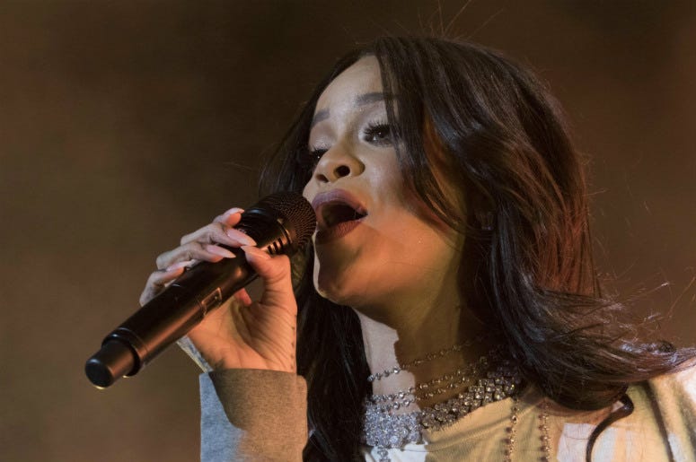 Rihanna performing at White River State Park. 100.3 Jack FM,Rihanna,Called Out,Snapchat,Instagram,Offensive,Ad,Chris Brown,Slap,Punch,Domestic Violence,Abuse,National Network to End Domestic Violence,Performing,Onstage,Singing,Rap,White River State Park