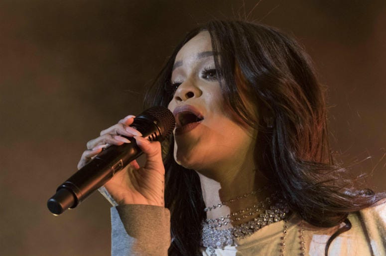 Rihanna performing at White River State Park. 100.3 Jack FM,Rihanna,Called Out,Snapchat,Instagram,Offensive,Ad,Chris Brown,Slap,Punch,Domestic Violence,Abuse,National Network to End Domestic Violence,Performing,Onstage,Singing,Rap,White River State Park