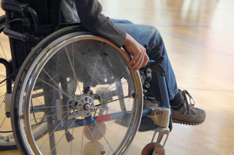 Man in a wheelchair. 100.3 Jack FM,Wheelchair,Accessible,Option,Feature,New,Google,Google Maps,Travel,Transportation