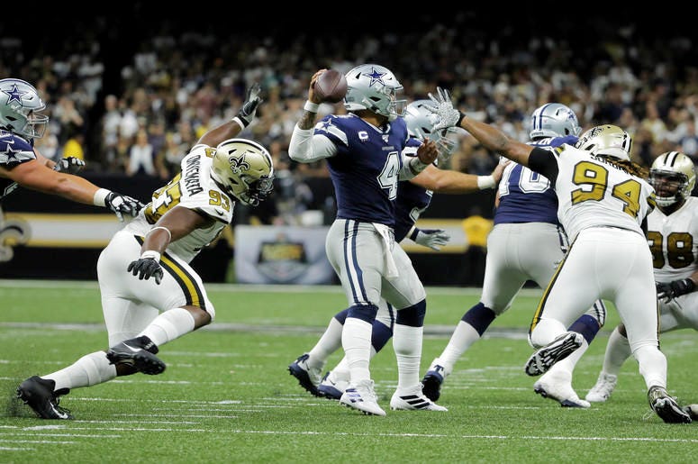 Dallas Cowboys quarterback Dak Prescott, against New Orleans Saints defense Dallas Cowboys quarterback Dak Prescott, against New Orleans Saints defense