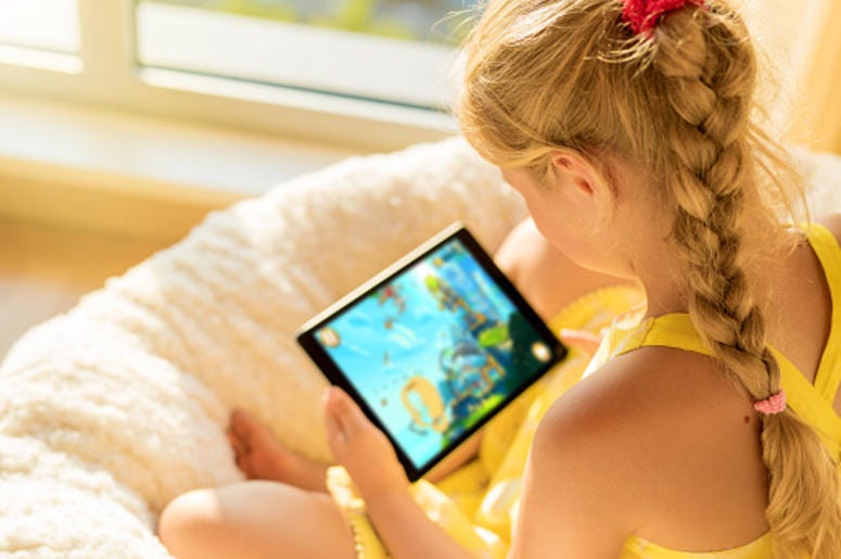 Kid on an iPad