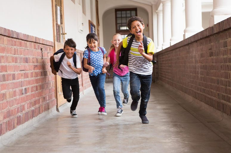 kids running in school
