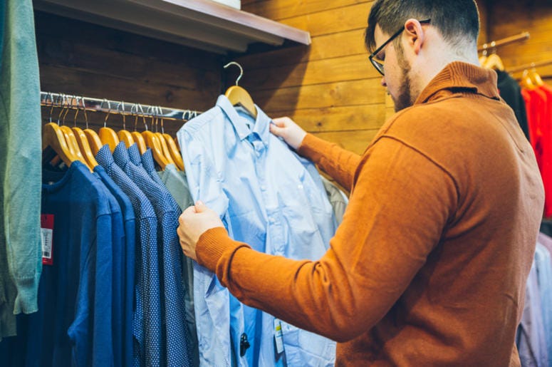 Man Picking Out Clothes