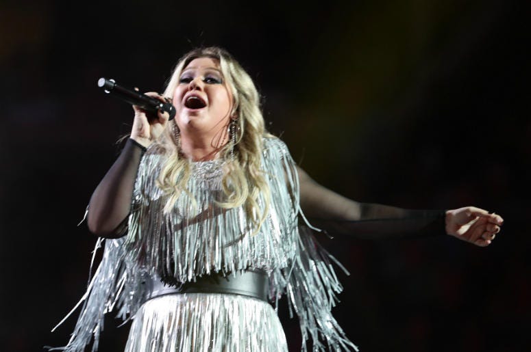 Singer-songwriter Kelly Clarkson performs during the opening night ceremony at Arthur Ashe Stadium during Day One of the 2018 US Open Tennis Championship Singer-songwriter Kelly Clarkson performs during the opening night ceremony at Arthur Ashe Stadium during Day One of the 2018 US Open Tennis Championship