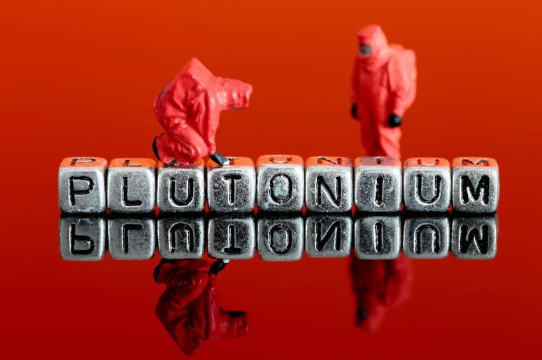 Miniature scale model team in chemical suits with the word plutonium on beads. Plutonium,Idaho,State,University,Lost,Misplaced,Missing,Radioactive,Material,Weapons-Grade,Nuke,100.3 Jack FM