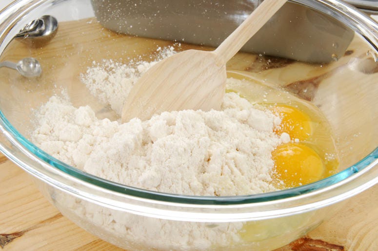 Cake Mix, Glass Bowl, Eggs, Wooden Spatula Cake Mix, Glass Bowl, Eggs, Wooden Spatula