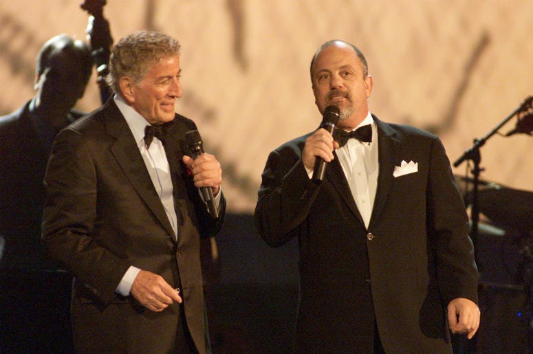 Tony Bennett (L) and Billy Joel (R) perform during the 44th Annual Grammy Awards Tony Bennett (L) and Billy Joel (R) perform during the 44th Annual Grammy Awards
