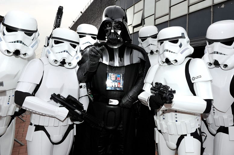 Darth Vader and Stormtroopers from 'Star Wars' MANCHESTER, ENGLAND - JUNE 05: Darth Vader and Stormtroopers attend adidas Host The Street Party at Coronation Street, ITV studios on June 5, 2010 in Manchester, England. (Photo by Shirlaine Forrest/Getty Images for adidas)