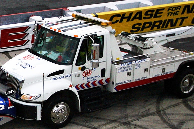 A tow truck A tow truck pushes (Photo credit: Chris Trotman/Getty Images)