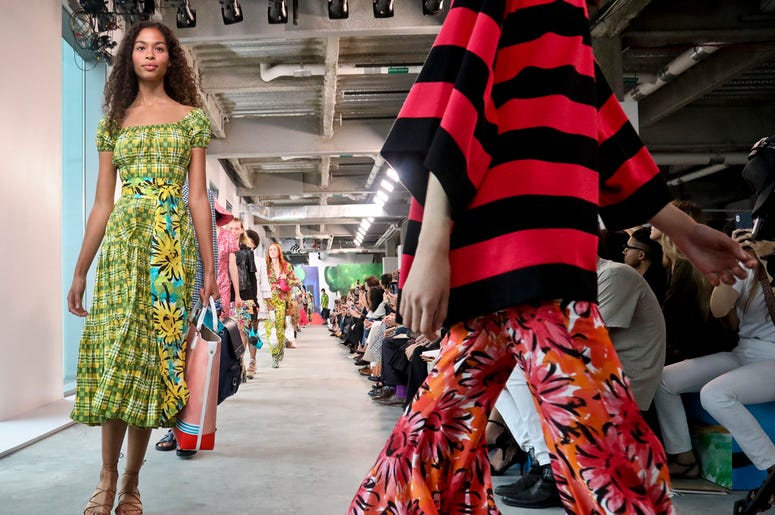 AP18255638094400 Fashion from the Michael Kors collection is modeled during Fashion Week, Wednesday Sept. 12, 2018 in New York. (AP Photo/Bebeto Matthews)