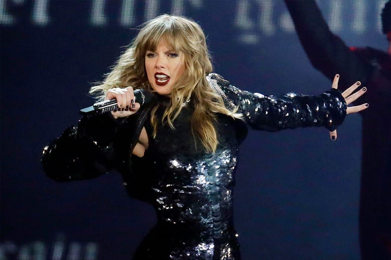 AP18282595631226 This May 8, 2018 file photo shows Taylor Swift performing during her "Reputation Stadium Tour" opener in Glendale, Ariz. (Photo by Rick Scuteri/Invision/AP, File)