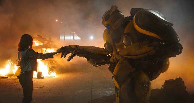 AP18356093446624 This image released by Paramount Pictures shows Hailee Steinfeld as Charlie and Bumblebee in a scene from "Bumblebee." (Paramount Pictures via AP)