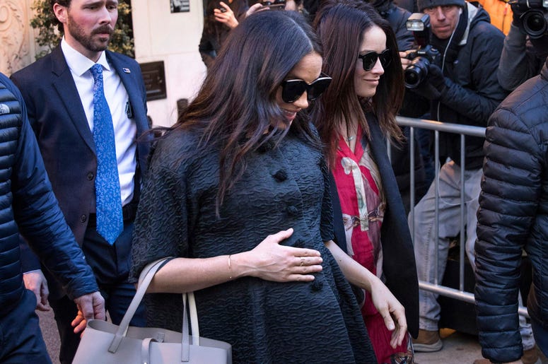 AP19050733663557 Meghan, Duchess of Sussex, leaves the Surrey Hotel ahead of her baby shower at the Mark Hotel on Tuesday, Feb. 19, 2019, in New York. (AP Photo/Kevin Hagen)