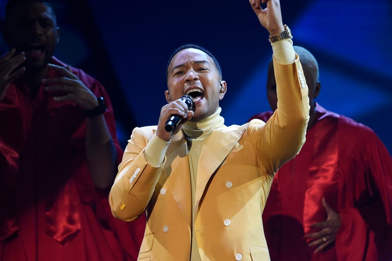 AP19162161072492 In this March 14, 2019, file photo, John Legend performs "Preach" at the iHeartRadio Music Awards at the Microsoft Theater in Los Angeles. (Chris Pizzello/Invision/AP, File)