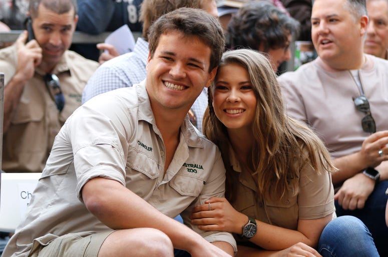 AP19205746130339 This April 26, 2018 file photo shows Chandler Powell, left, and Bindi Irwin at a ceremony honoring the late Steve Irwin with a star on the Hollywood Walk of Fame in Los Angeles. (Photo by Willy Sanjuan/Invision/AP, File)