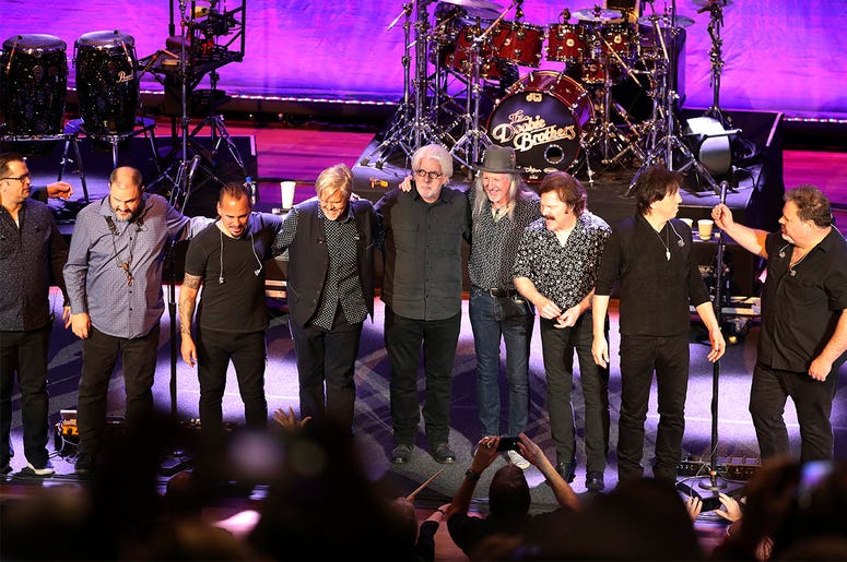 AP19323158376599 The Doobie Brothers stand on the stage at The Doobie Brothers at Ryman Auditorium, Monday, Nov. 18, 2019, in Nashville, Tenn. (Photo by Al Wagner/Invision/AP)