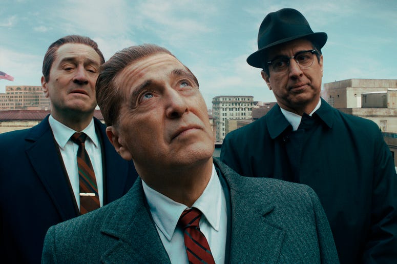 AP19338805597453 This image released by Netflix shows, from left, Robert De Niro, Al Pacino and Ray Romano in a scene from "The Irishman." On Monday, Dec. 9, 2019, Pacino was nominated for a Golden Globe for best supporting actor in a motion picture for his role in the fi