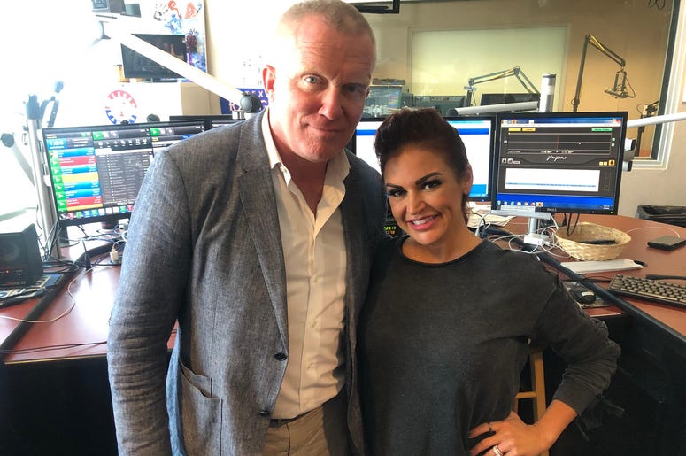 (Sybil Summers/ Entercom Radio) Anthony Michael Hall and Sybil in the 98.7 KLUV studio