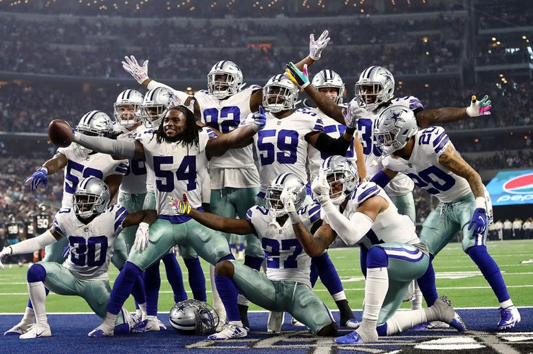 (Ronald Martinez/ Getty Images) Jaylon Smith #54 and the Dallas Cowboys defense celebrate a fumble recovery against the Jacksonville Jaguars at AT&T Stadium on October 14, 2018 in Arlington, Texas.